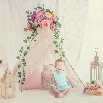 This is a composite of my daughter Cambria.  She is 1.5 years old and will soon be a big sister to another little girl! I wanted her to pop with all the beautiful colors around her, so I placed her in this darling little dress that her cousin gave her. 