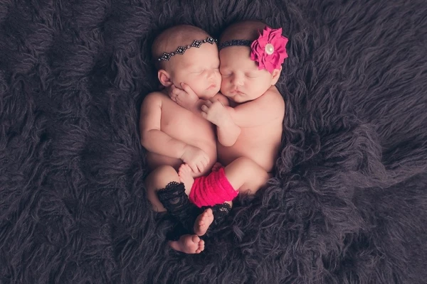 Leah and Lily have an amazing story. They are blessed to be adopted by the same wonderful family that adopted their big brother a few years earlier. It always amazes me how twins just cuddle up so sweetly when placed together.