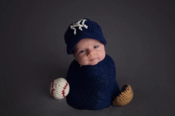 This picture was a special request from mom as she is the Yankee fan in the family.  I love the he is awake :)