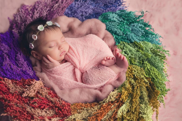 This a sweet Jaylee. She is a precious blessing to her family. She is their rainbow baby.  Her big sister was born sleeping two years before she was born, and her mommy wanted to acknowledge this with a rainbow theme. 