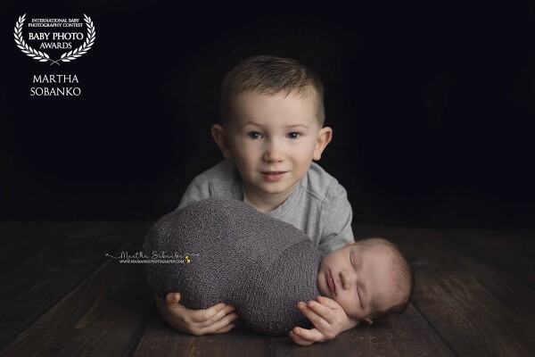 How perfect is this duo?!  Big brother was very eager and excited to participate in taking photos with his baby brother <3 Having two boys myself I adore this picture and I hope one day so will these two.