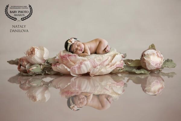 Baby Ariana was 8 days old at the time of the session and she was the best model for me. She slept perfectly all session. I did maternity session for her mom and we decided to use same color for her newborn session. 