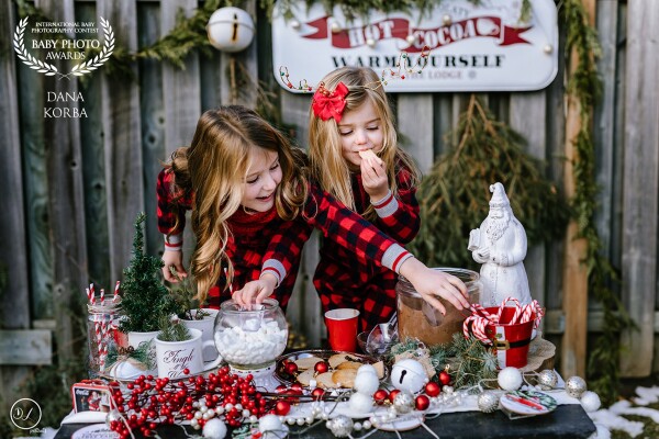 These two adorable sisters really enjoyed the hot cocoa bar. They had so much fun tasting  treats along the way. There can never be too many marshmallows right?  