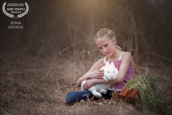Thank you so very much for choosing my image, This was done during a farm inspired session, the owner was fabulous and was close by to help and the bunny was as sweet as could be. I love the expression on her face. 