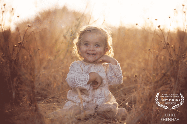 SMILE. I feel that this image completely reflects the saying: "Capturing the moments of today that will wow your heart tomorrow". In this picture, you can see the 18-month-old baby Ella in a sweet moment of joy. A smile worth a thousand words.<br />
