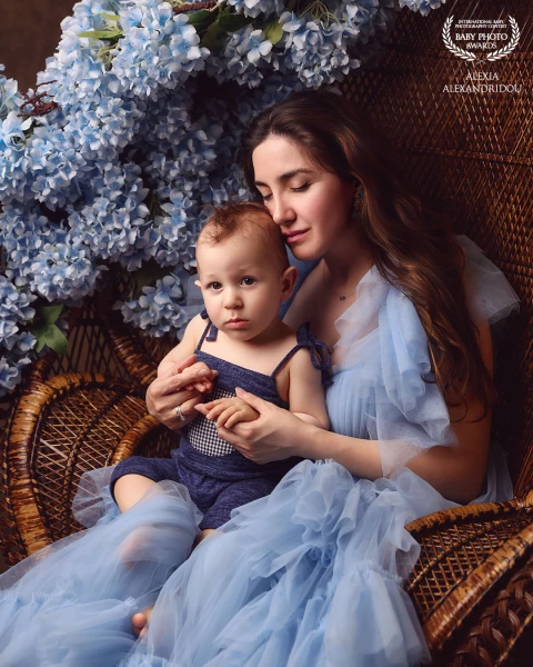 A portrait celebrating the tender bond between mother and child , a moment of pure love, wrapped in light and lavender dreams.