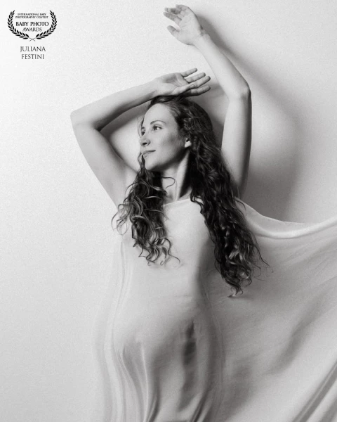Every curve, every breath, every beat — a testament to the life blooming within.