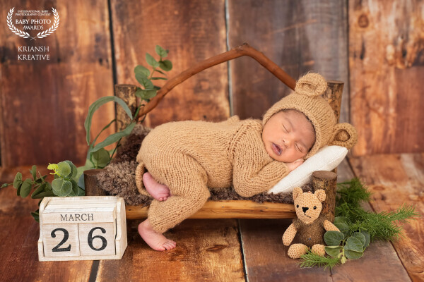 Wrapped in golden warmth, this tiny dreamer rests in a world of soft textures and gentle light — a p...