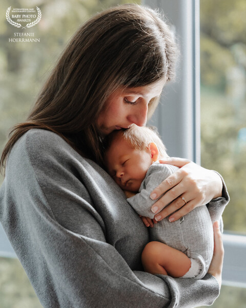 This emotional moment of a mother holding her baby to her heart.