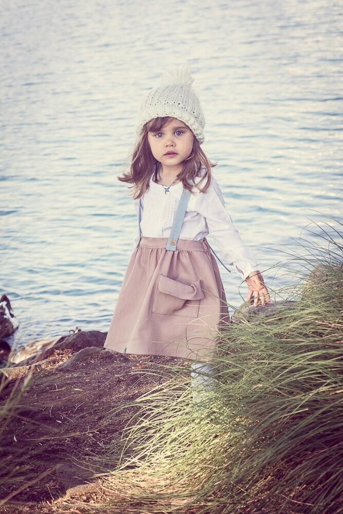 Little girl walking around the lake. Appriciate what we have in life.