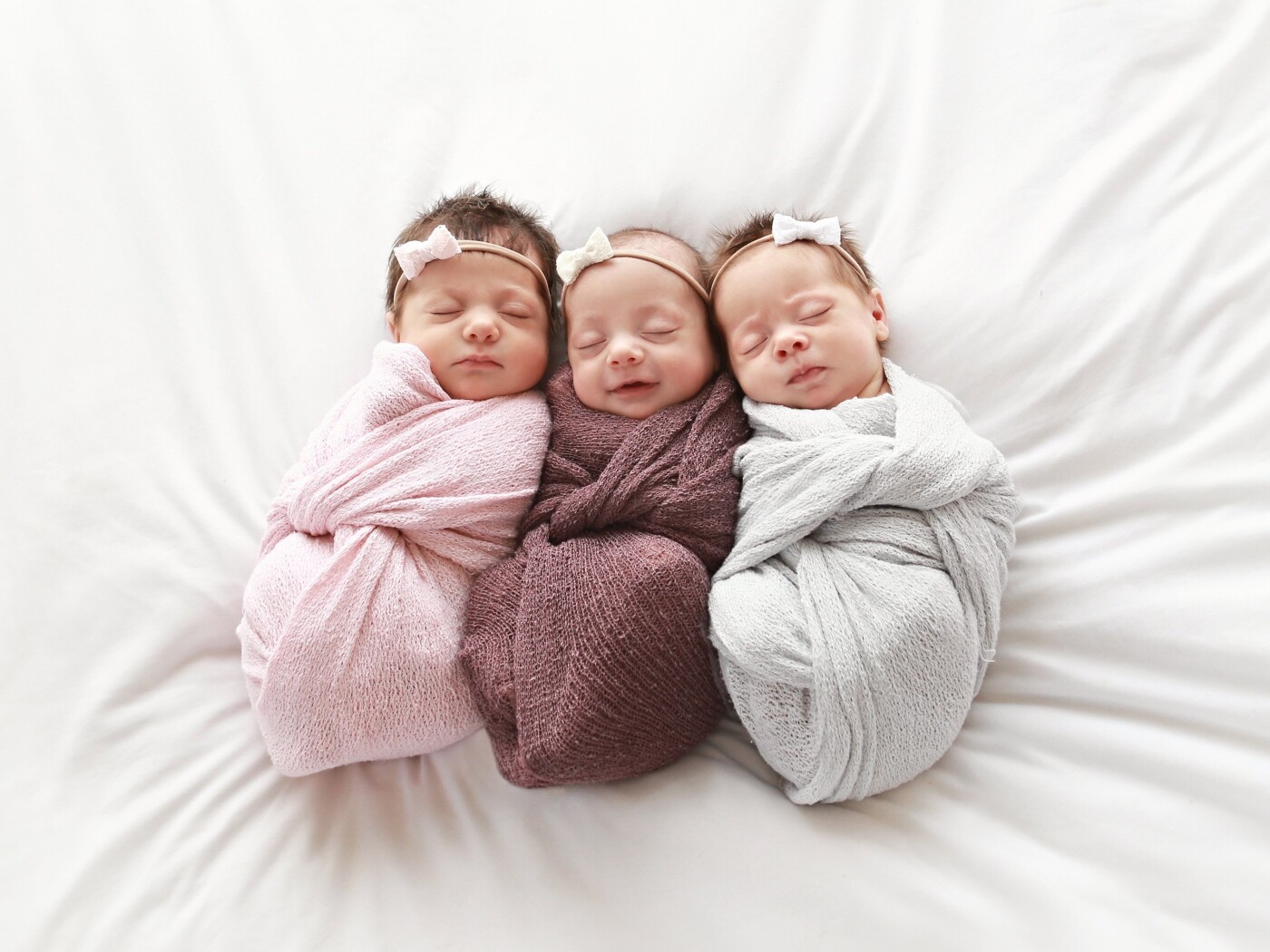 Having Triplets myself I was ecstatic when I booked a newborn session with Triplet Girls. These sweet girls did great at their session. I'm so happy we got this image. It will be a treasure for their family forever. 