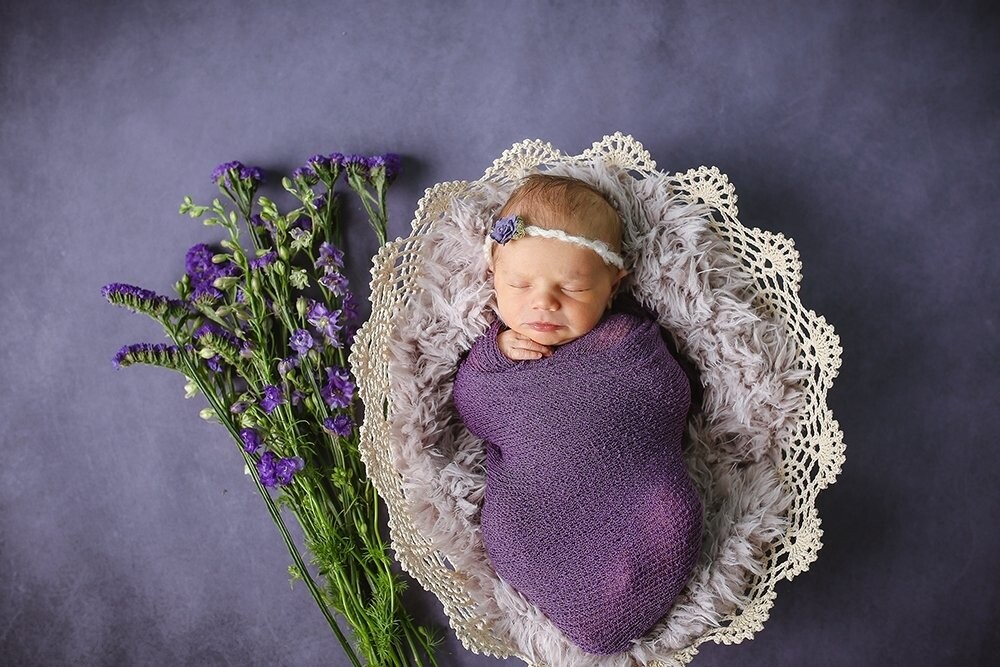 On this photo, mom informed me of her name and that she wanted to include as much purple as possible. I bought the flowers the morning of and had a vision in my mind the minute I got into my studio. Violet brought it to like with her sweet little face! 