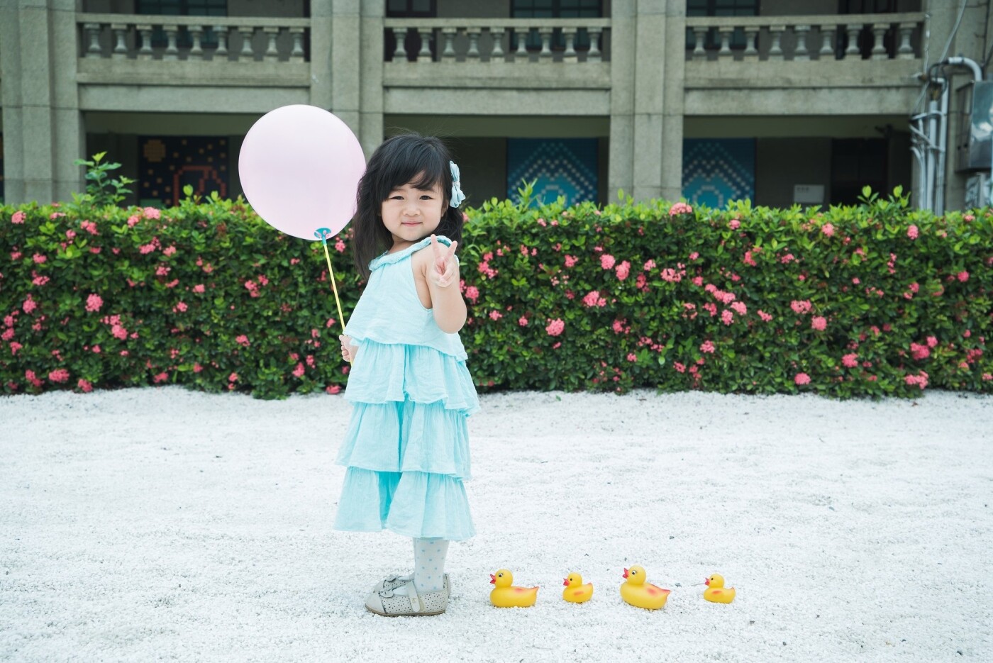 Yellow Rubber Duck, a common toy for every child, is featured in this photo, indication of happy childhood, surrounded by the love of family and friends.