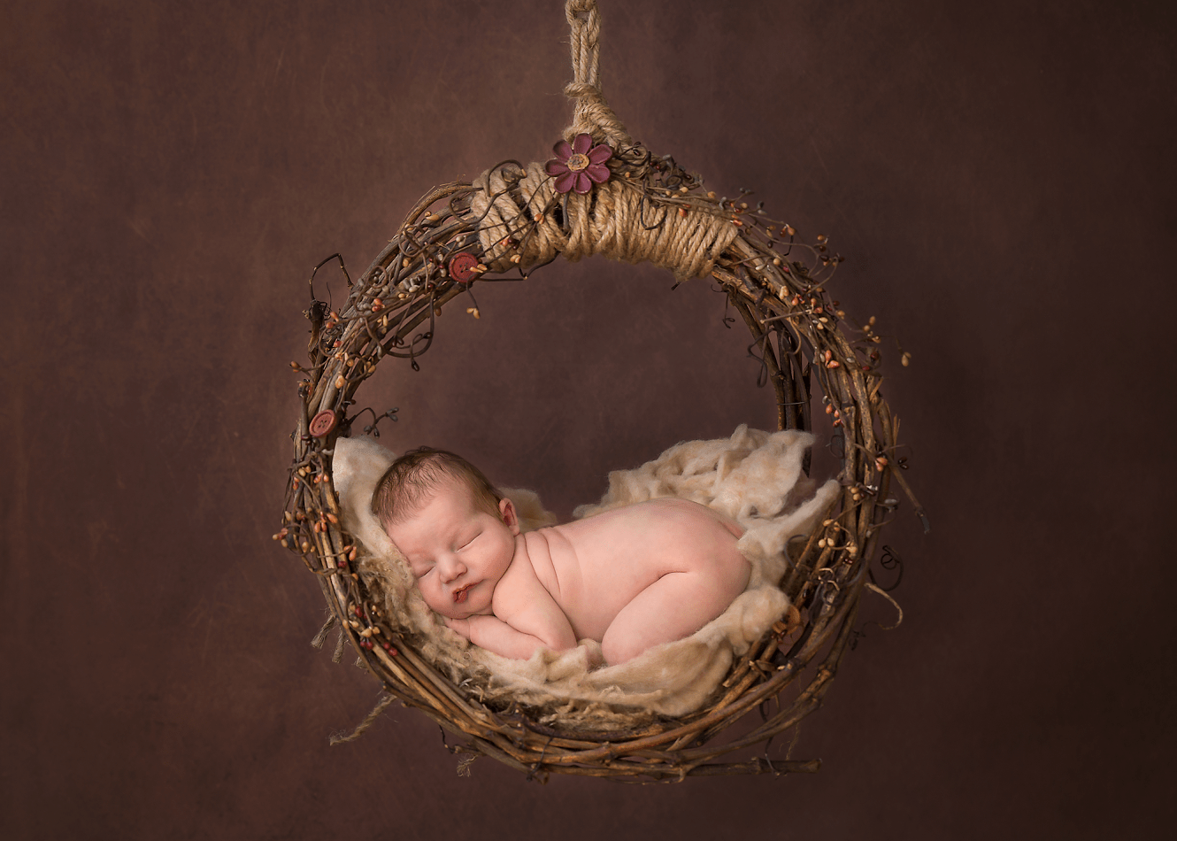 This image is of gorgeous baby Luna Gem, and it was taken when she was just 8 days new! This is such an amazing time to capture newborns.The image was taken using natural light in my home-based studio. I chose earthy toned props for a timeless look. Luna Gem was such a gorgeous baby to photograph - so tiny, cute and squishy!