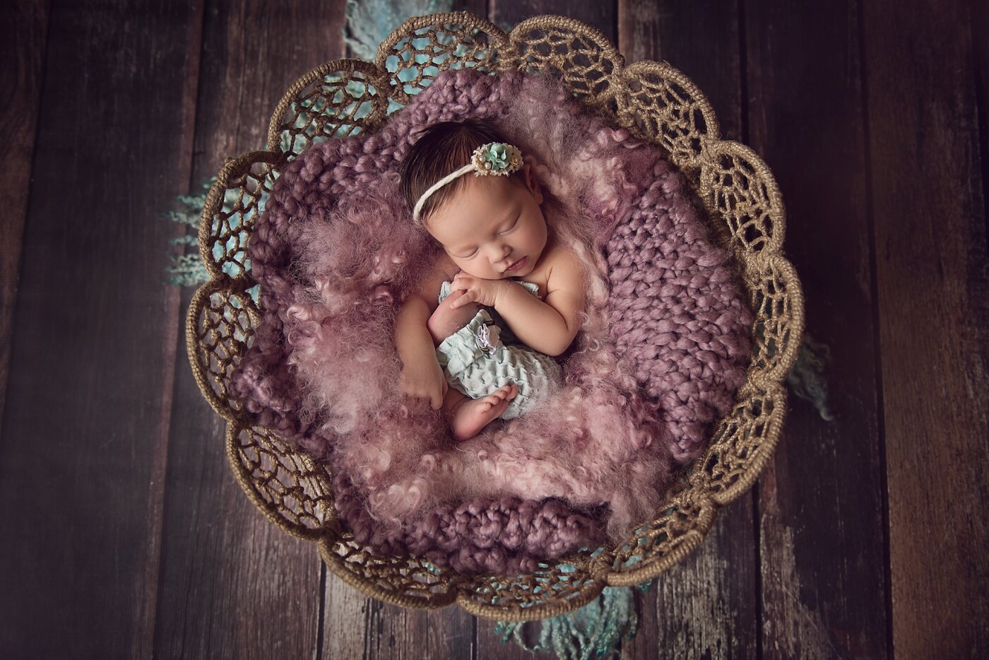 As a newborn photographer people trust you with their precious babies and everlasting memories, this parent had total belief in me and my visions.When I told mum I'm going to be combing blues & purples she couldn’t ‘see it’ but said go for it.<br />
I love this photo, I love this precious baby, I love combing colour.