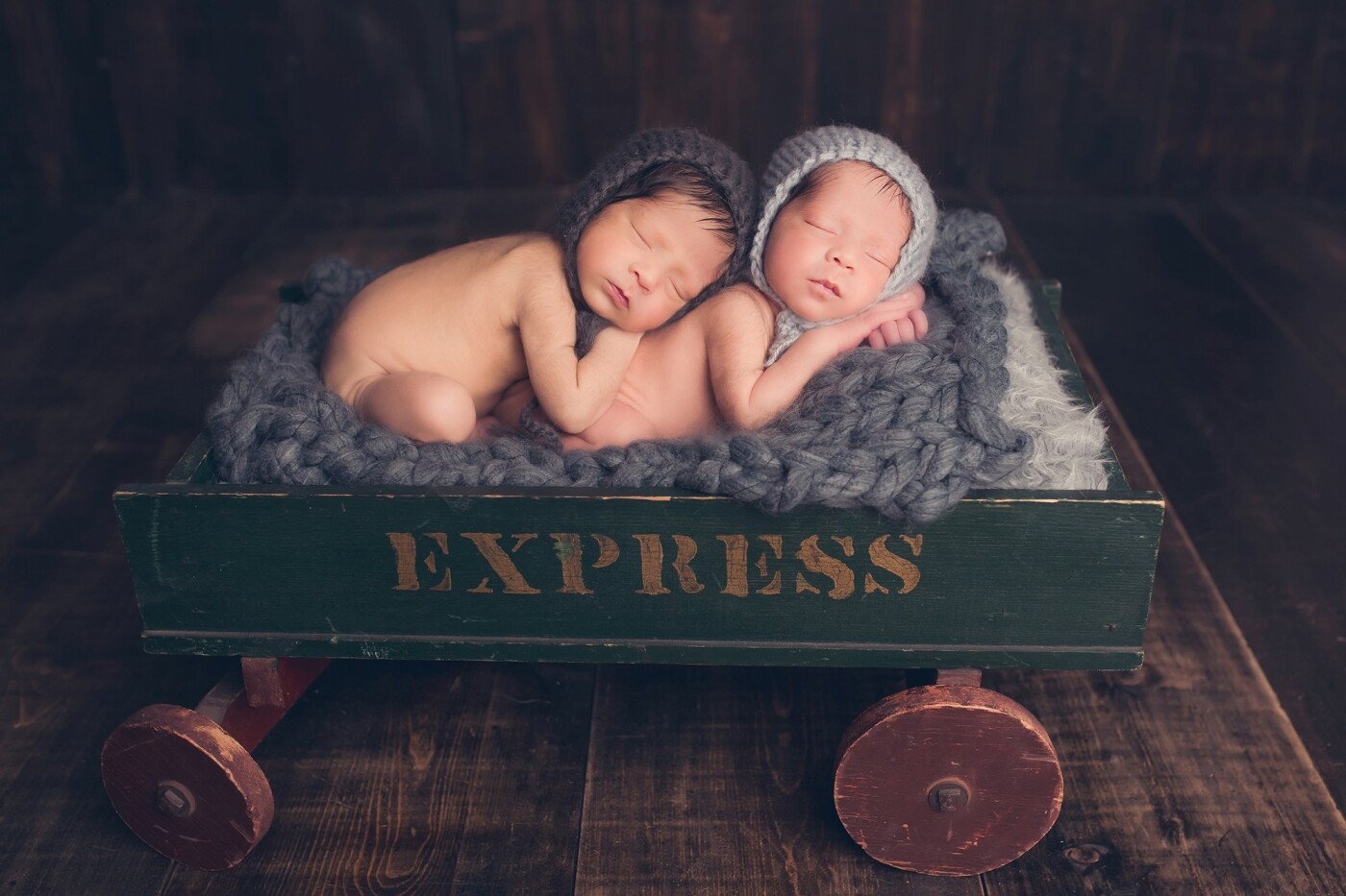 I loved working with these twin brothers. Their mother loved the vintage feel of the bonnets and the vintage toy wagon.  I love how peaceful the boys look sleeping cuddled together. I was blessed to have Devoted Knits bonnets and layering pieces to use during this session.      