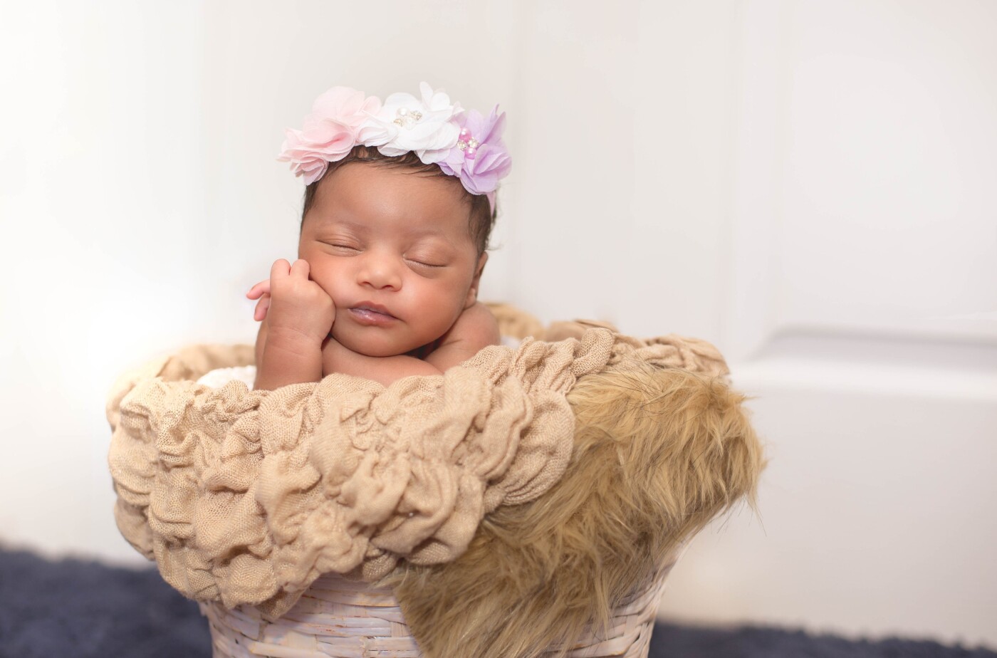 Newborn sessions don’t always go as planned. This was Amara's second time visiting me in her 1st couple weeks in this world. I’m so glad we were able to capture this cute image and can you believe this was my first composite? All I can say is Adorable, Welcome Baby Amara!!!