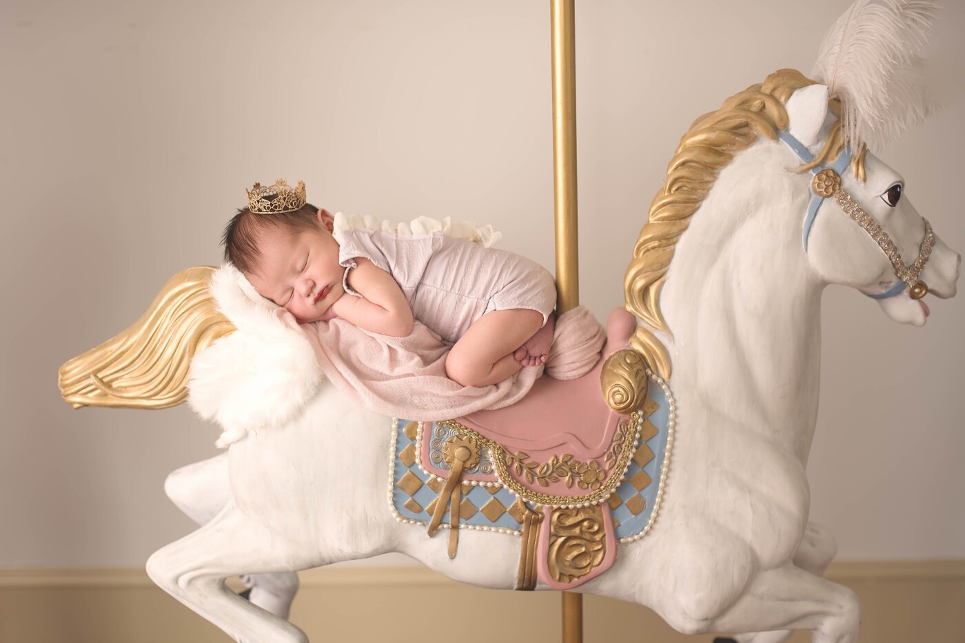 This image was a composite on my carousel horse using mom and dad to help:) Mom LOVES carousel horses and when she saw mine as a prop in the studio she had to use it for their session!