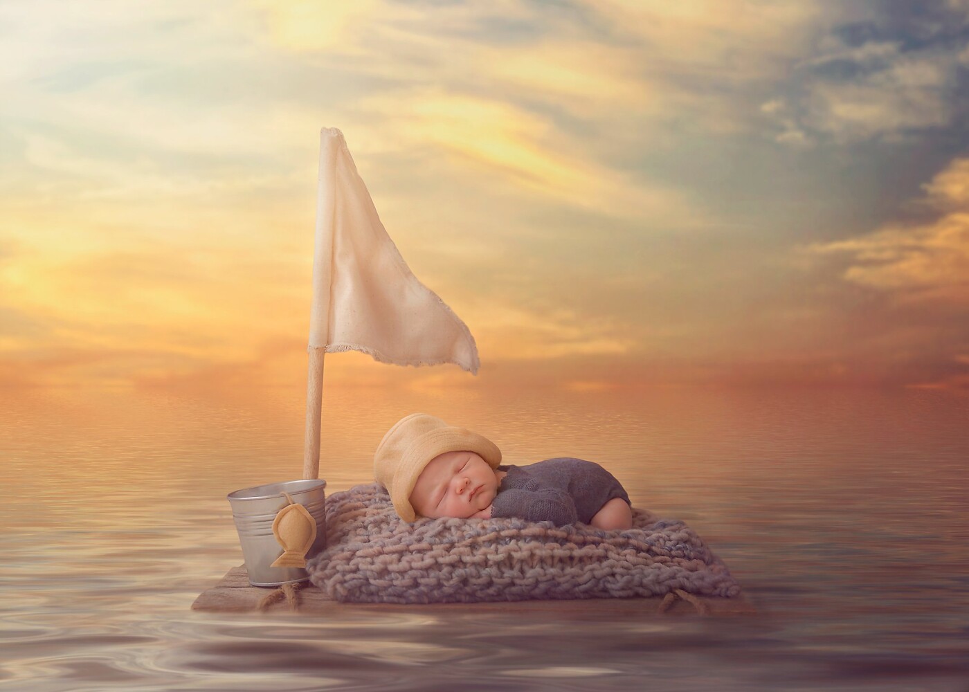 This image was a composite image. I felt like having a little play around and being a bit creative. The raft is home made, and the image was taken in my home based studio. It was a cloudy day, so I used my Jinbeii continuous light. I then used a gorgeous digital backdrop :)