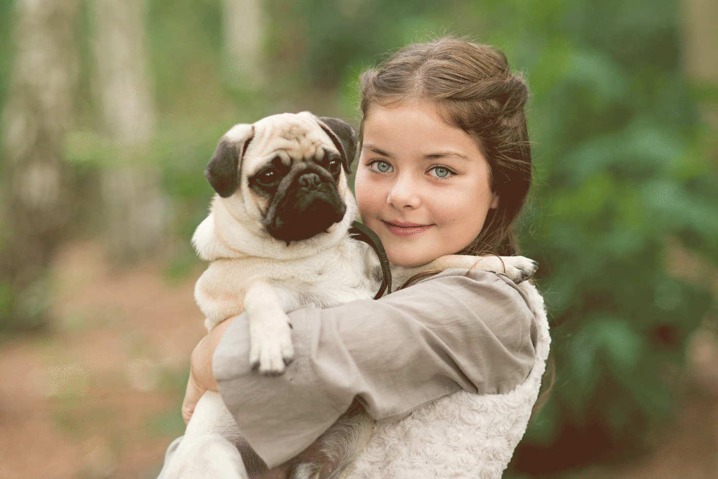Noortje, who's got the most amazing blue eyes,  loves her dog and it shows. <br />
The two of them make a handsome pair.<br />
I love the unique connection between children and their pets.