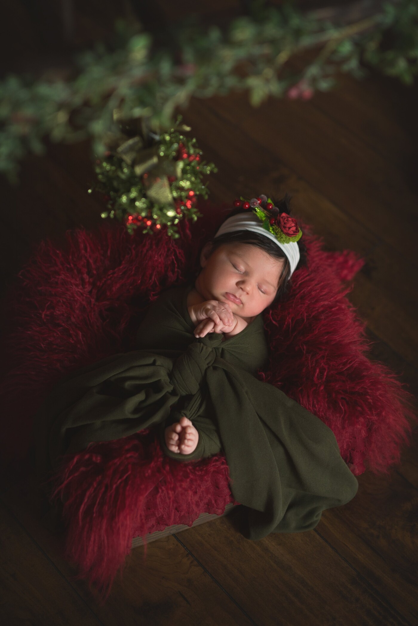 First holiday photo of this sweet little girl in my new studio. She's dreaming of a Merry Christmas and all the snuggles and cuddles she is going to get for her first Christmas. What a living doll.
