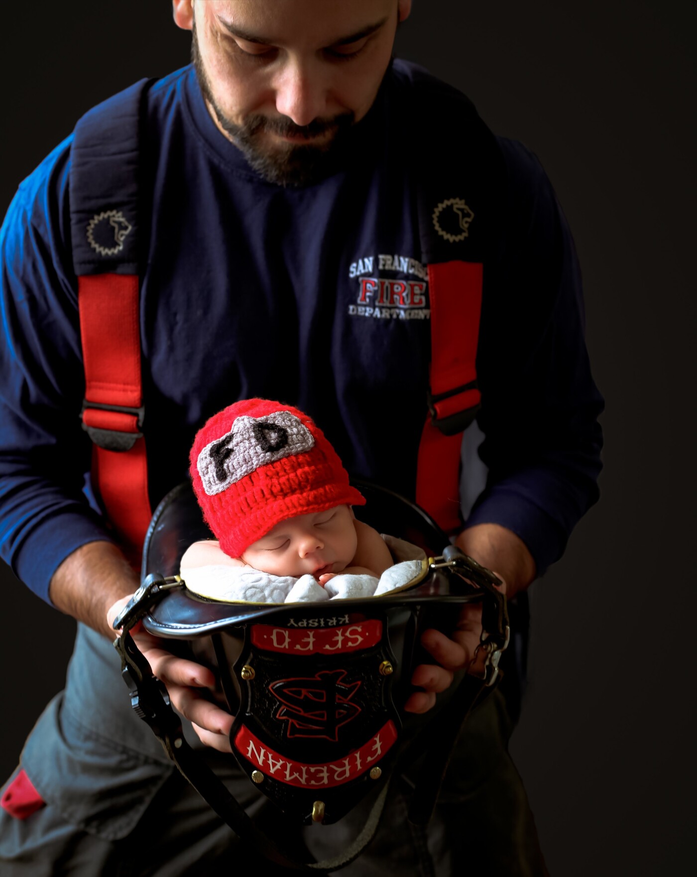 This is Mac and his Daddy who is a San Francisco firefighter. This was such a fun shoot at their home! For the safety of baby this is a composite shot. <br />

