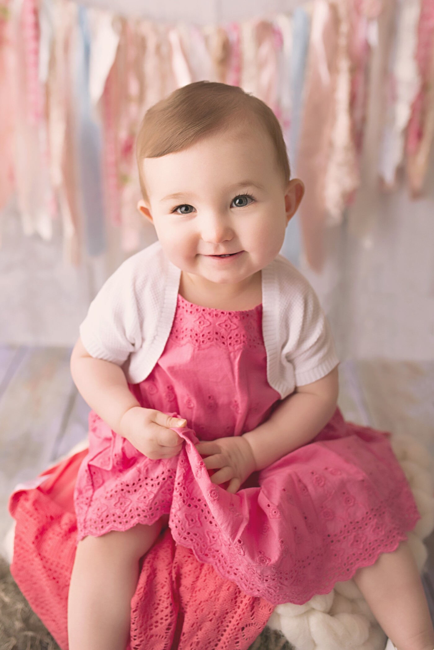 This little sweetheart has the perfect complexion for these lovely pastel colors.  I have been photographing her since she was a newborn and she is a doll.