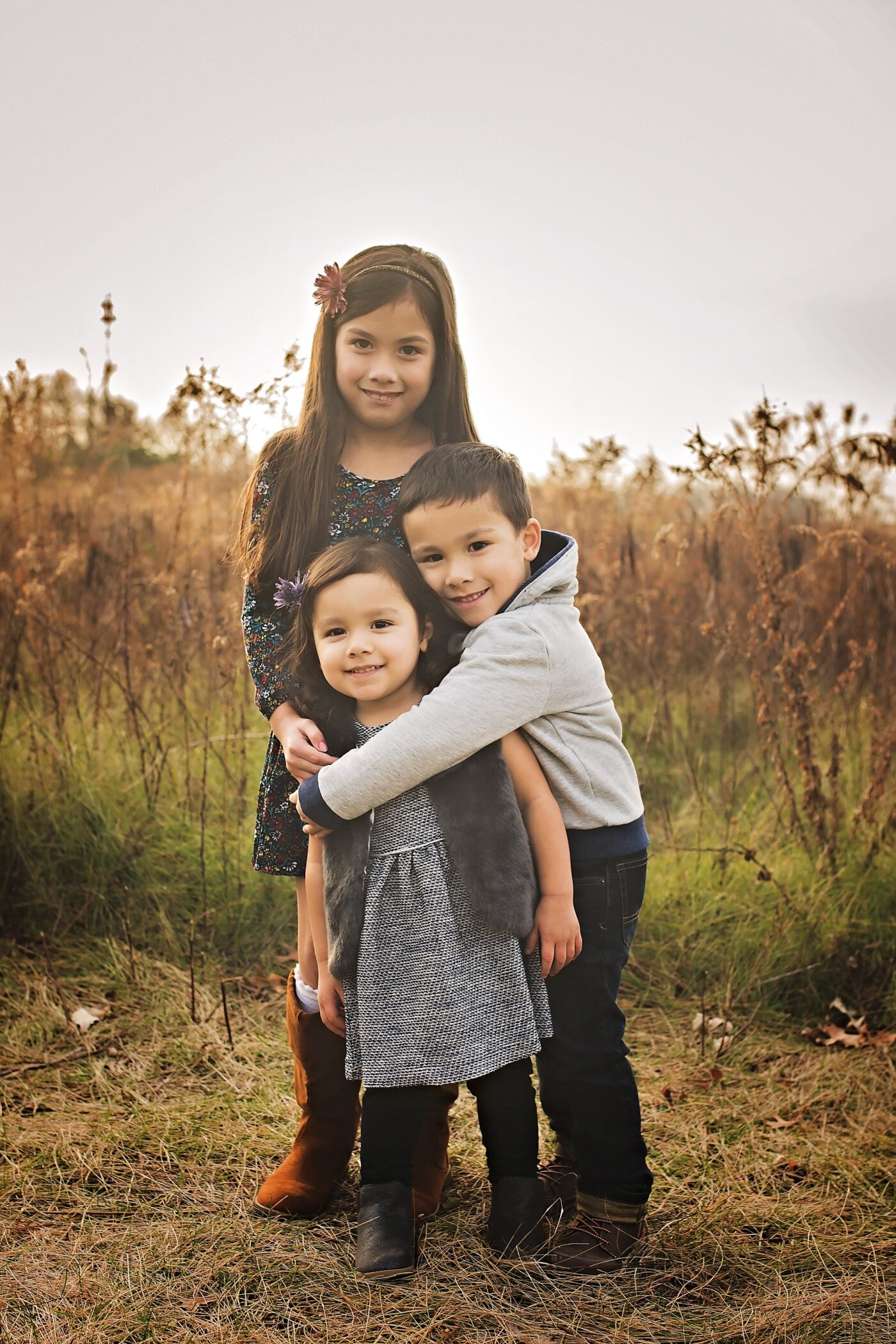 These three were adorable.  When it came time for their photos together during their family session, they went into this hug naturally.  You can see the love they feel for each other and that is what I strive to capture.