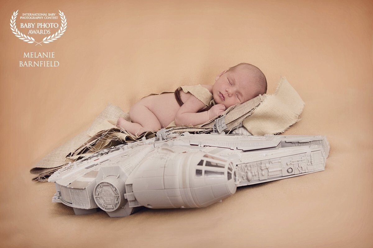 Meet Baby Rae.  Instantly we had a connection - Star Wars!  My little boy lent me his millennium falcon and Baby Rae's parents were thrilled to be able to bring one of their favourite movie saga's into the session.  Such a joy to photograph and we had fun creating this selection of images.