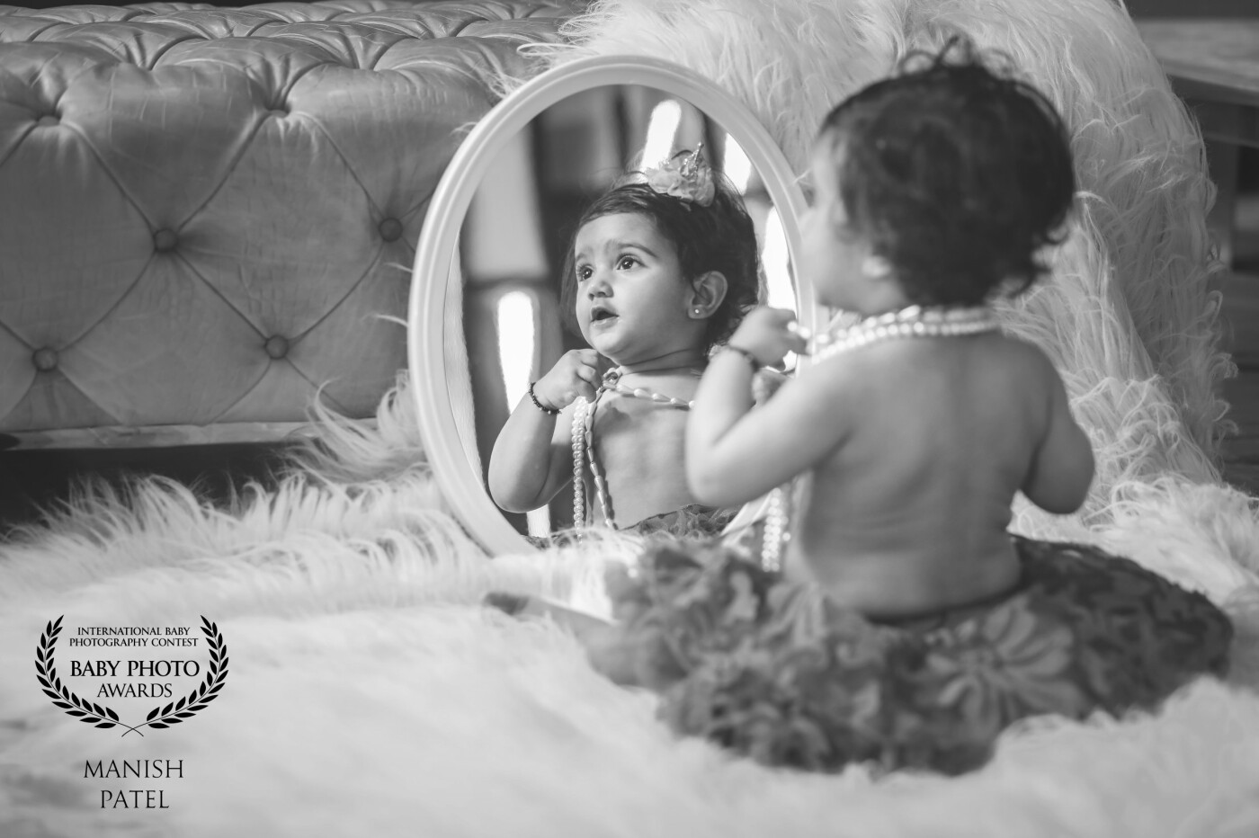 The Mirror reflection of her Is Just Like The Love Of God is Reflecting Blessing on her.<br />
I like to create interesting compositions, a sense of legend or a kind of dream .<br />
This sweet little baby girl had an adorable smile that I was elated to capture.