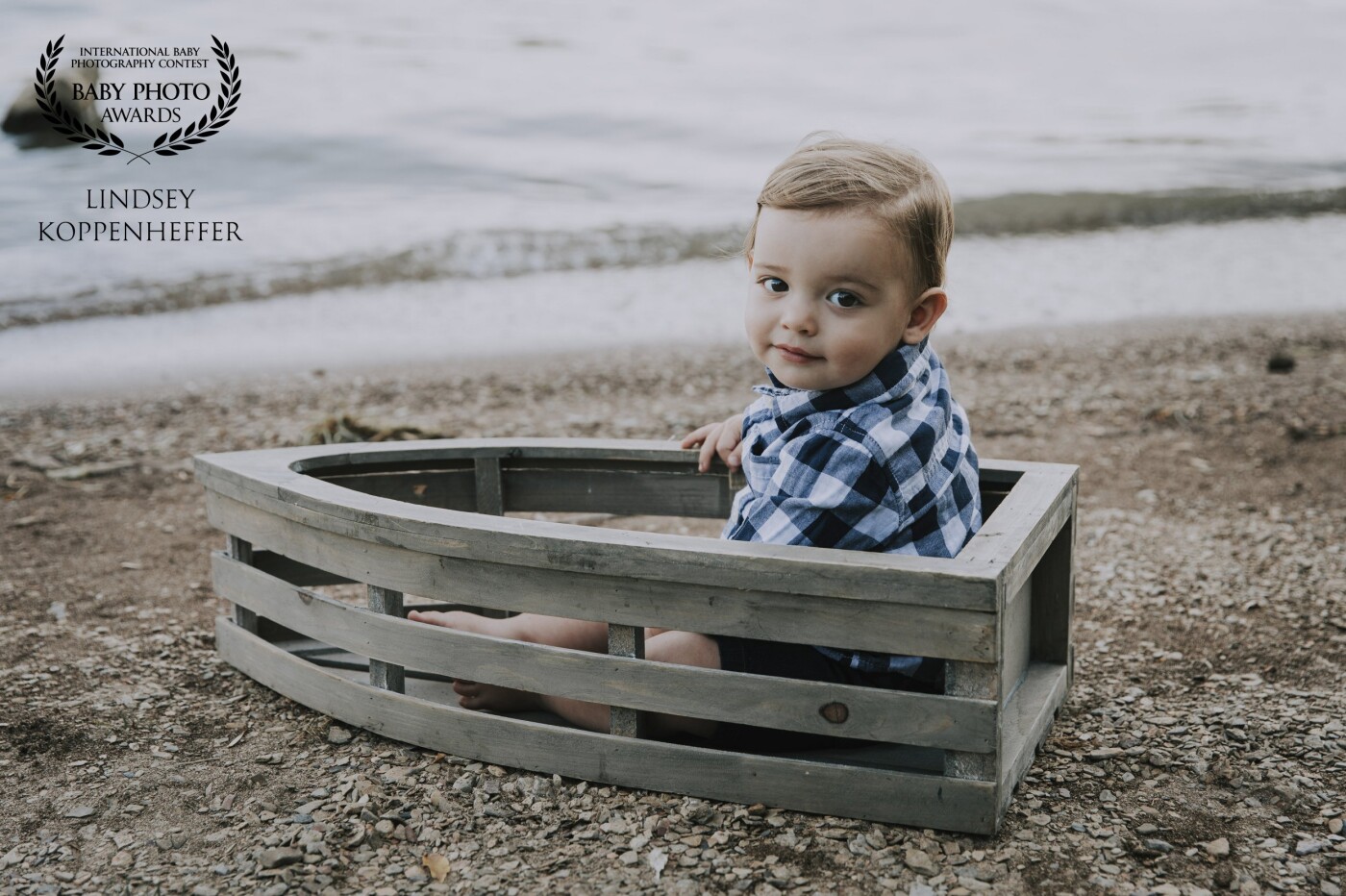 Meet Owen! In celebration of this handsome guy's first birthday we travelled to Blue Marsh Lake; Pennsylvania's own little beach nestled in Berks County. He was so incredibly sweet and happy making him an absolute joy to capture. This shot was one of the first taken during our session. He was still warming up to the camera and checking things out when I caught this adorable little expression. Look out ladies!