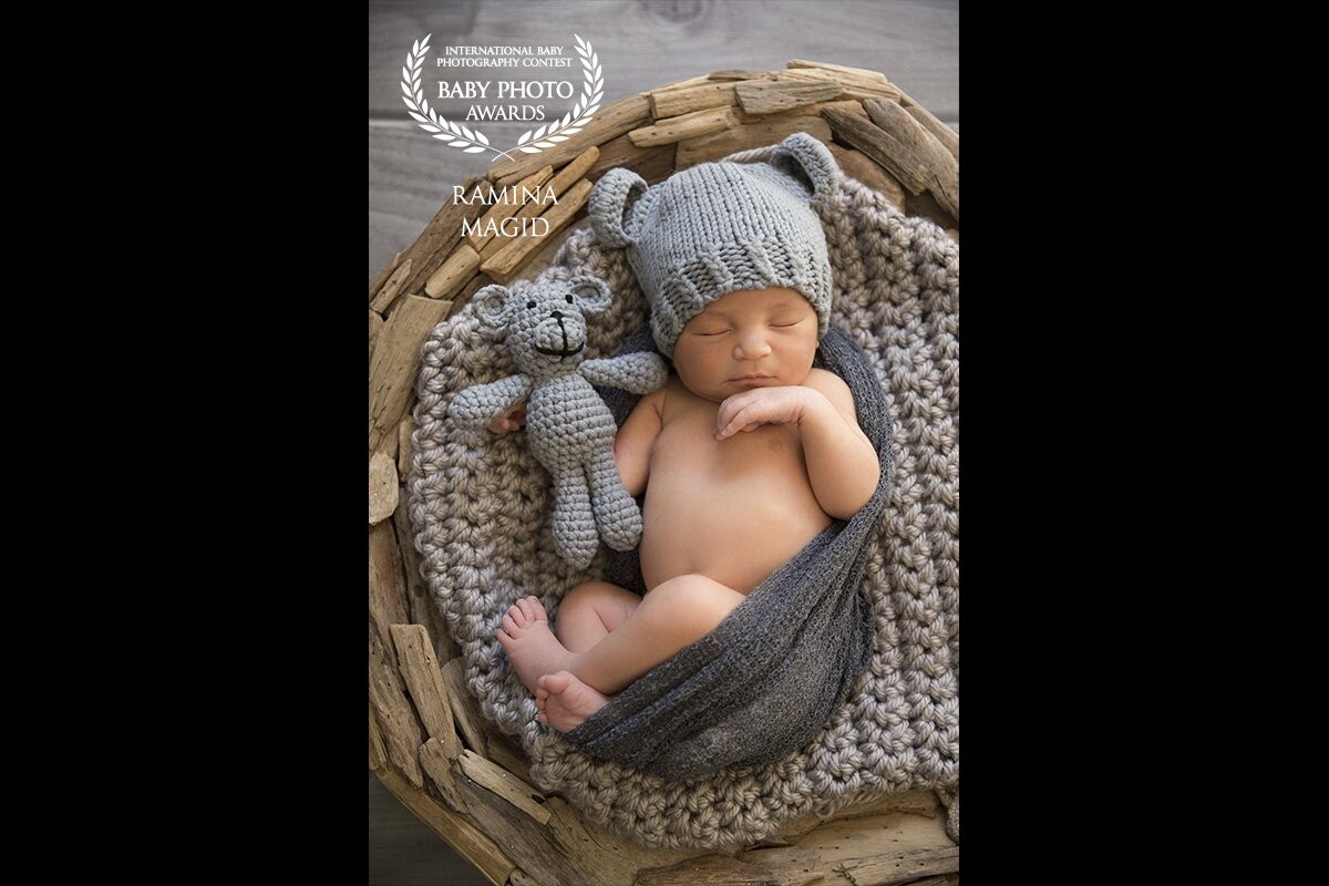 Please meet baby Cooper. When I photographed him, he was only 10 days old. He was so good to me, slept the entire session and I was able to take many beautiful candid shots. 