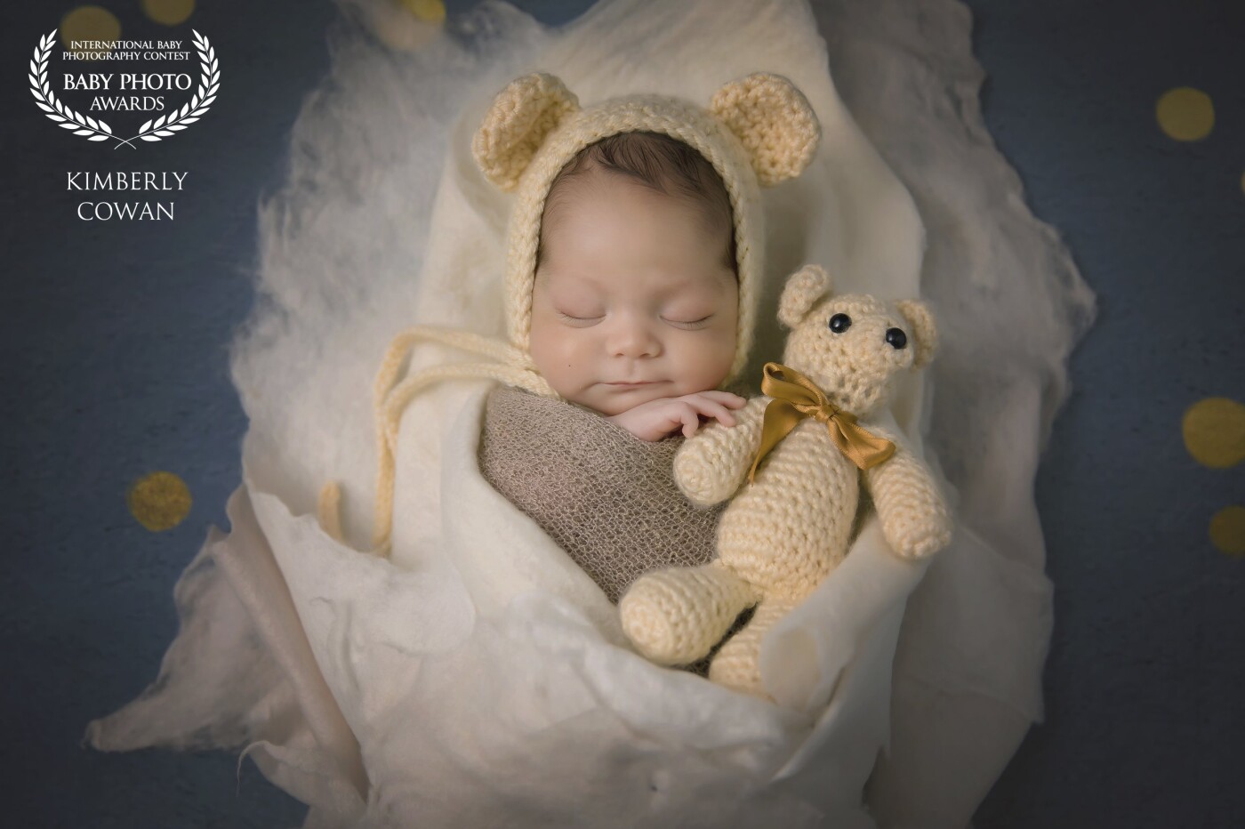 Do teddy bears dream?<br />
Baby Ian is a miracle NICU baby.  He spent his first 8 weeks of life in the hospital born at 34 weeks.   When momma brought him into the studio he was still a tiny guy at 5lbs but was so cuddly and didn't mind being posed for the camera.  