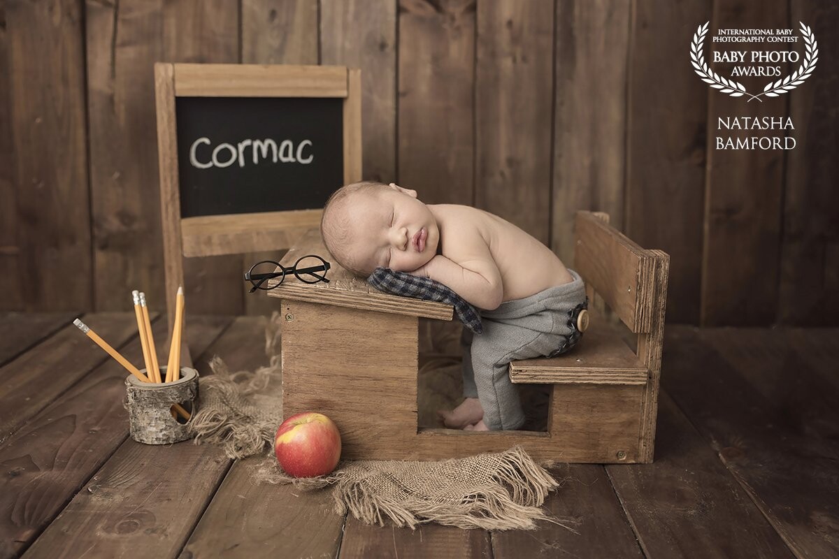 Cormac<br />
 This little guys mum is a school teacher so I just had to have a little fun and incorporate that into his session.  He was nice and sleepy at this part of the session which meant we got the shot pretty quickly. <br />
I love this image and I'm so happy it was chosen for an award. <br />
Natasha Bamford
