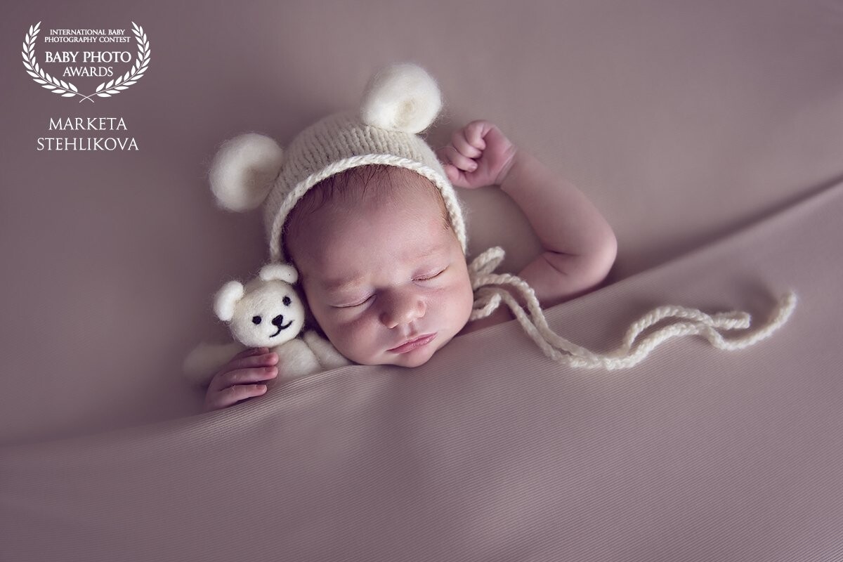Mathias was a pleasure to photograph. Only 8 days old. He was having a well-deserved sleep. A boy and his teddy bear ;-) So happy to win this award!