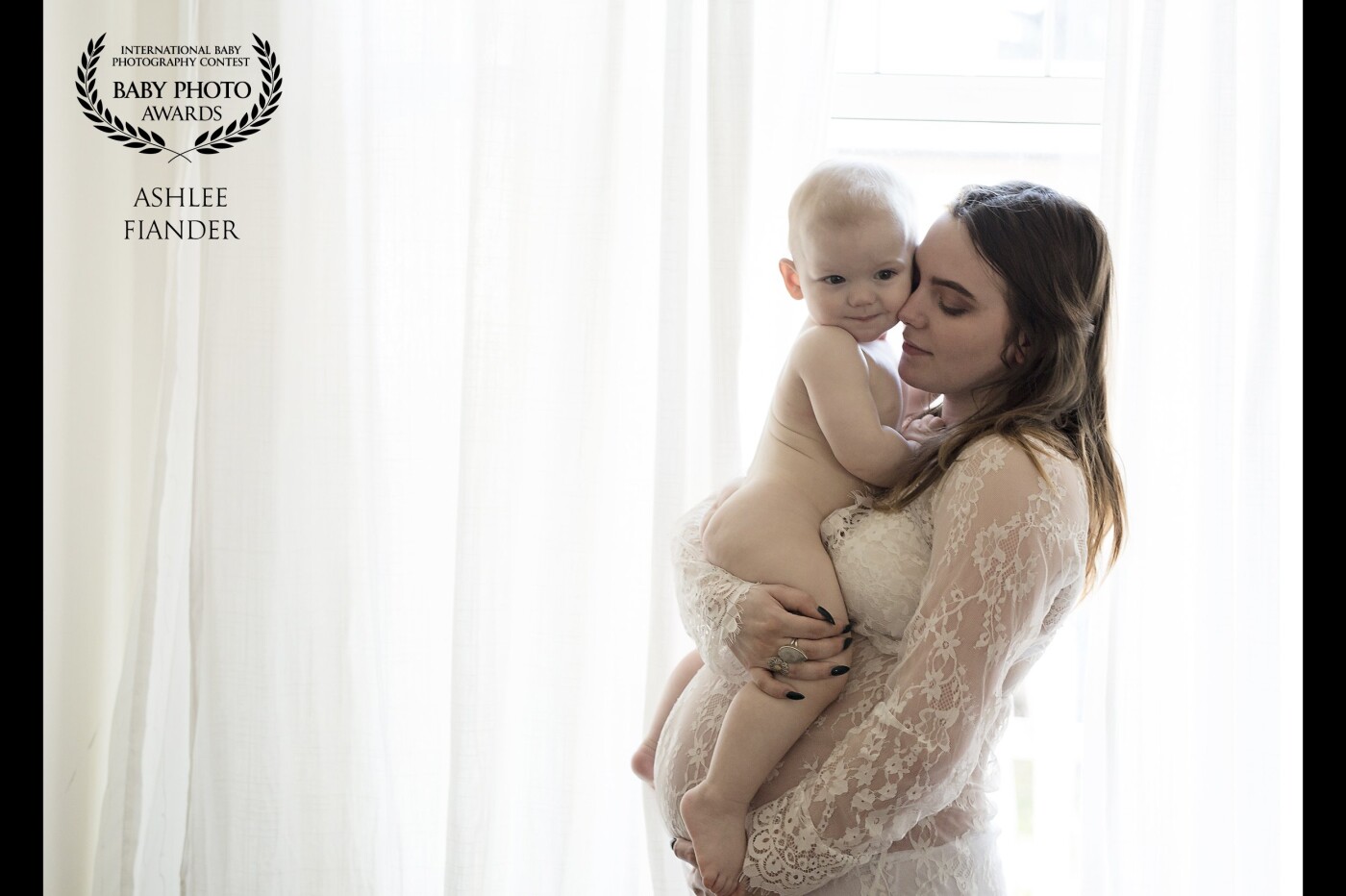 Such an honour to win an award with this image as it is very special to me, my cousin and her son Milo snuggling and loving her baby bump before baby Wynn arrived. This was taken in her home before a milk bath photo session and I just couldn't resist the gorgeous light coming through!