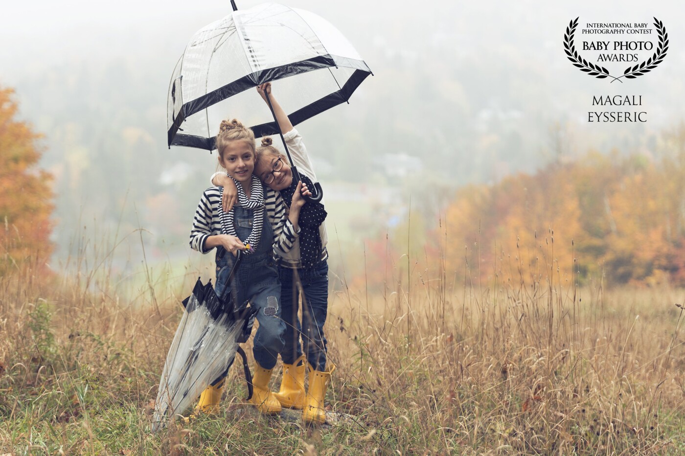 One autumn morning in the rain at the top of the Laurentian mountains.<br />
 I did a shoot with a small family, two small girls with a contagious energy, a beautiful smile and a beautiful yellow boot and all day fun ... love my job!