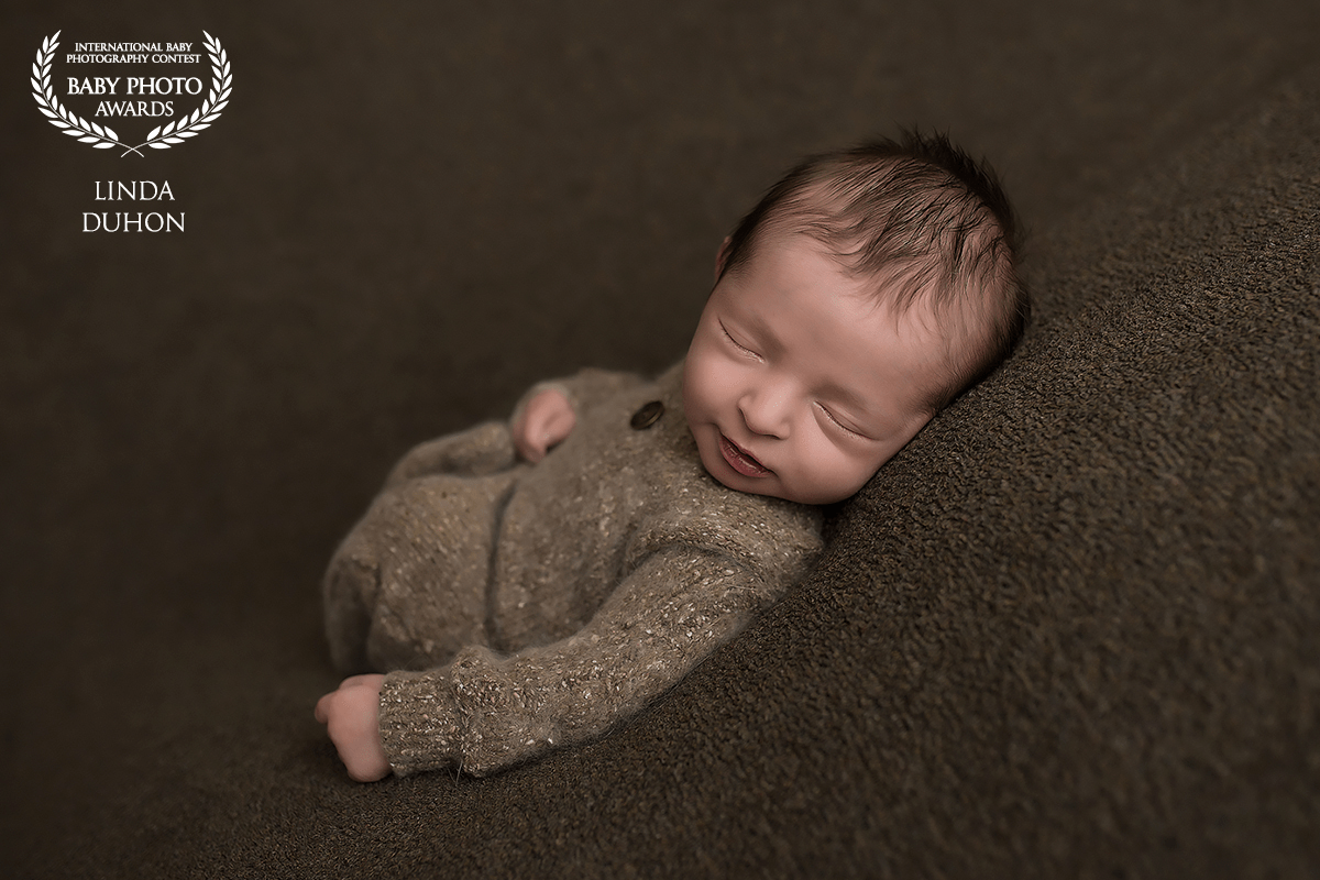 Sweet Reese was so happy and snug as a bug. I wonder what this little guy was dreaming about?!  He smiled his entire session! This entire session was almost all neutrals and came out so beautifully.  