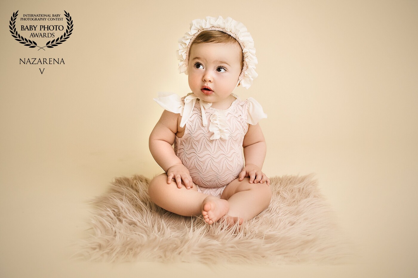 Anita - baby session.<br />
This photo was taken at my studio in Buenos Aires. I love photographing baby expressions. <br />
This one in particular is one of my favourites. That is why I have chosen this one because the way she looks is so beautiful. Creating a photo is about to start from the very beginning. When she came to my studio, all was set, and then we started shooting. She felt so comfortable that made me feel that too. The conexion that we created was amazing and that is why we had an excellent shooting. <br />
That was a day to remember.<br />
