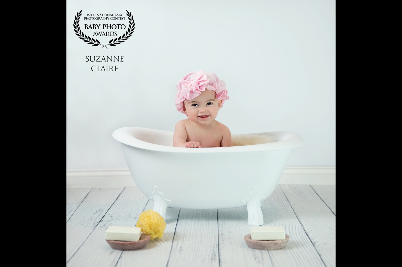 This beautiful little 7-month-old girl came for a fun photo shoot. I was so excited to try out my new idea with this little bath prop. Many great photos came from this photo shoot but this one was just perfect! It was a joy to work with such a happy baby!