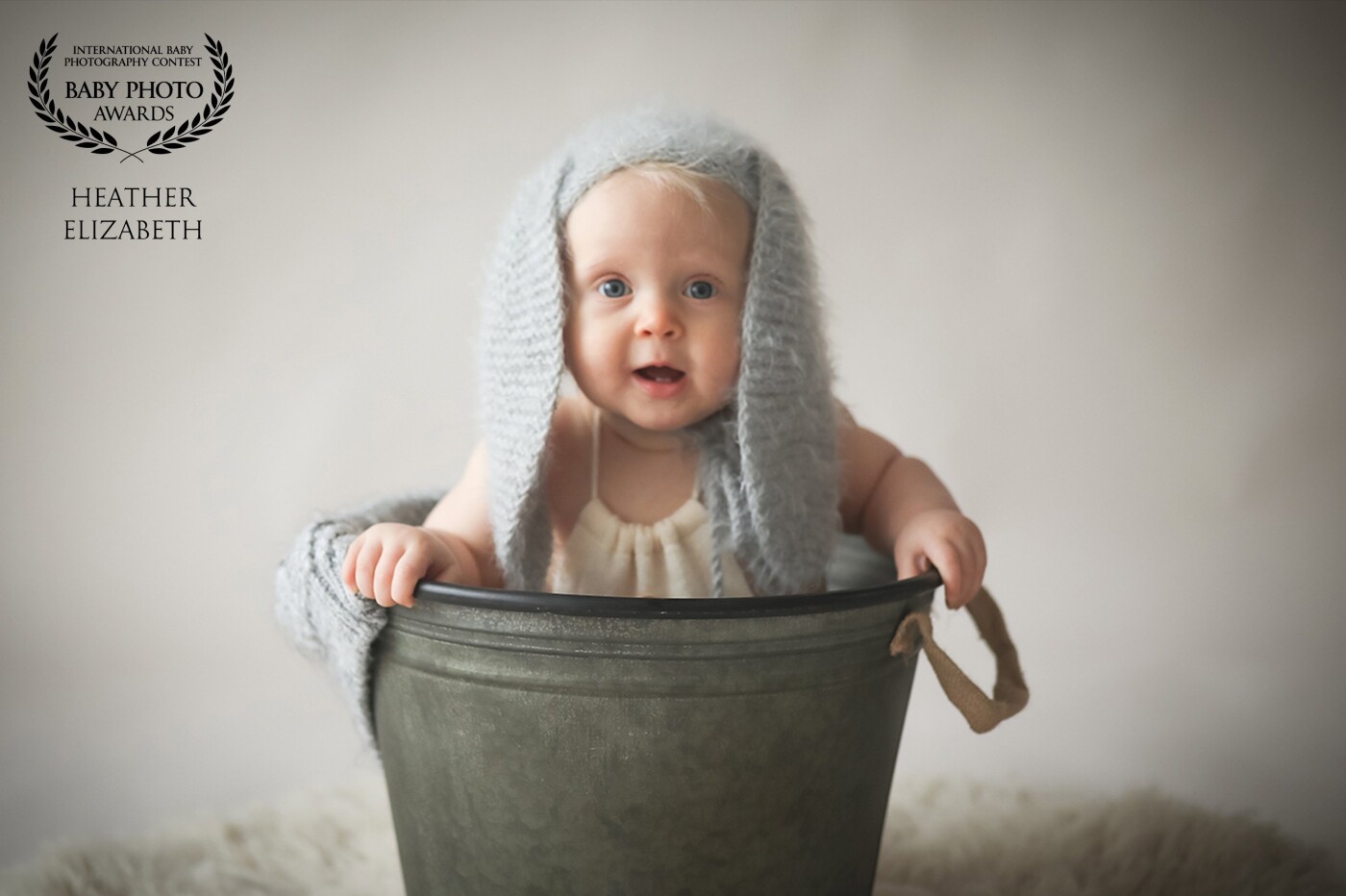 Whats not to love - a bunny in a bucket! <br />
This is the second time I have photographed Alexandra, first time was her newborn shoot. <br />
Sitter sessions are starting to become one of my favorite types of sessions and I love styling these ones. 