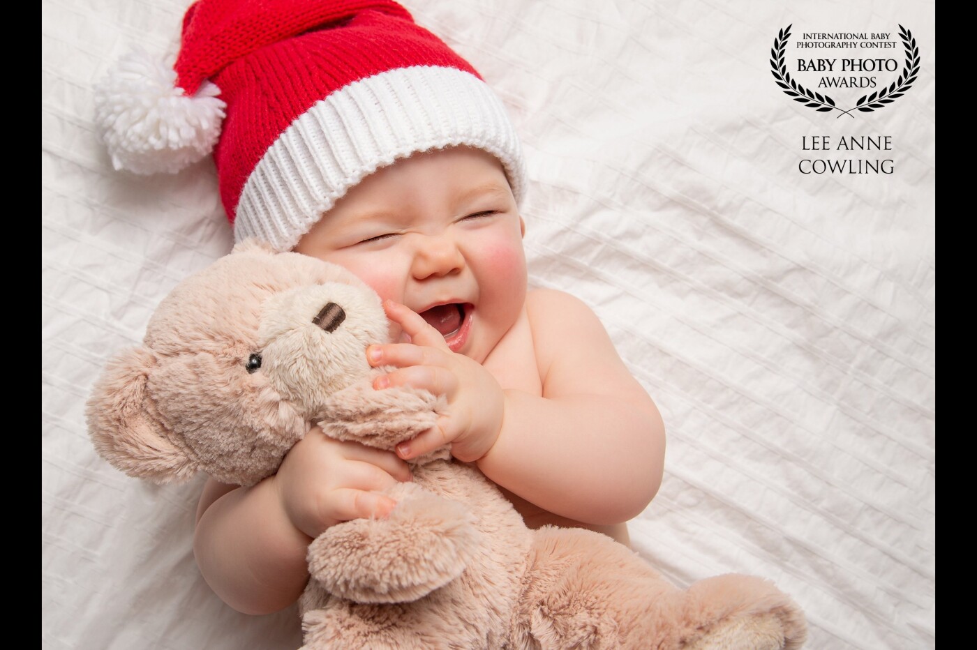 Sweet baby Ella is so excited for her 1st Christmas! <br />
I had the pleasure of photographing Ella for her newborn session and was thrilled when she came back for a Christmas session as well. <br />
She's the perfect baby and I'm pretty sure she's made it on Santa's nice list this year!<br />
 