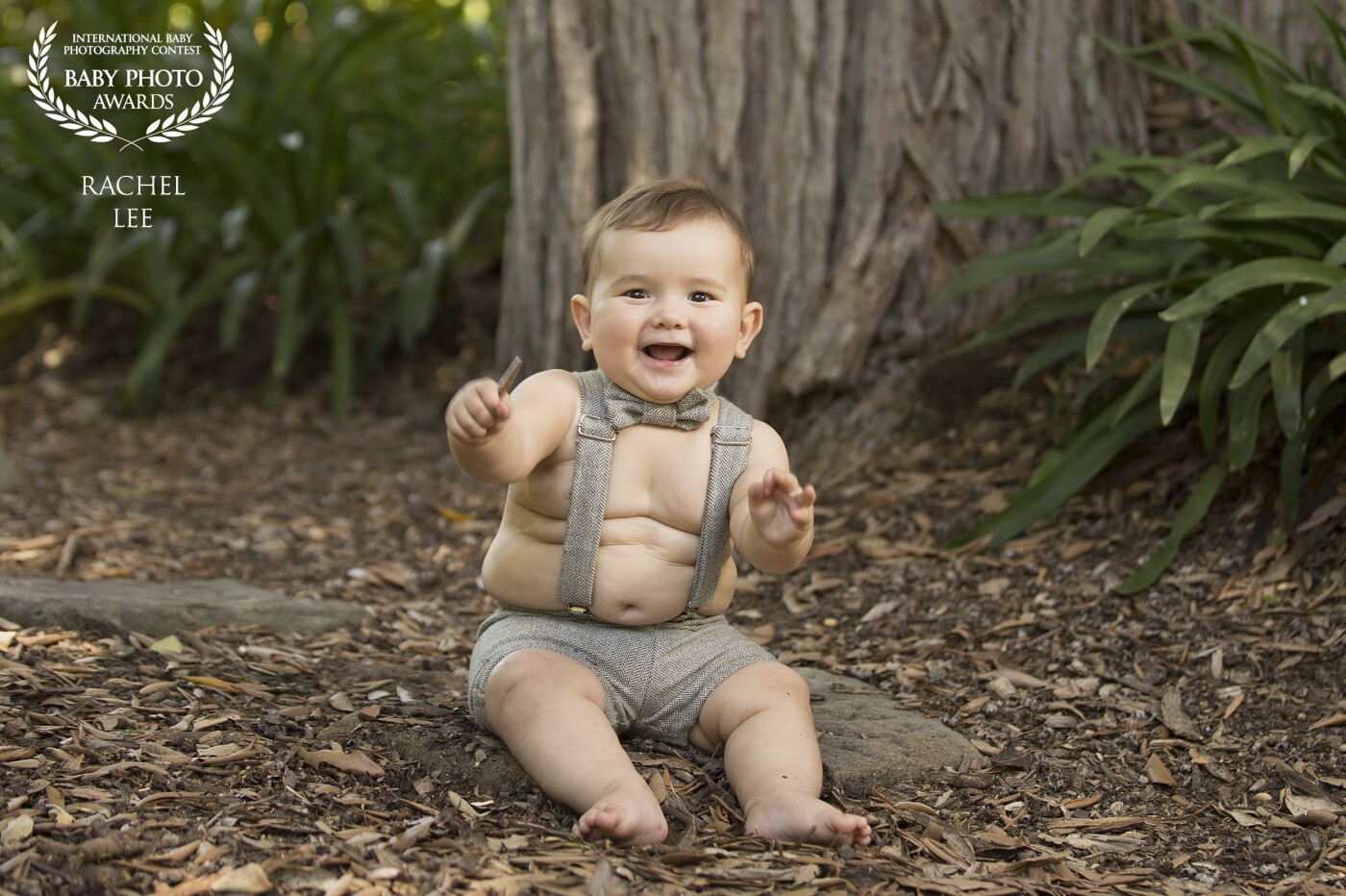 Those rolls! That smile! This little guy loved exploring the leaves (apparently they don't taste great!), playing and laughing. 