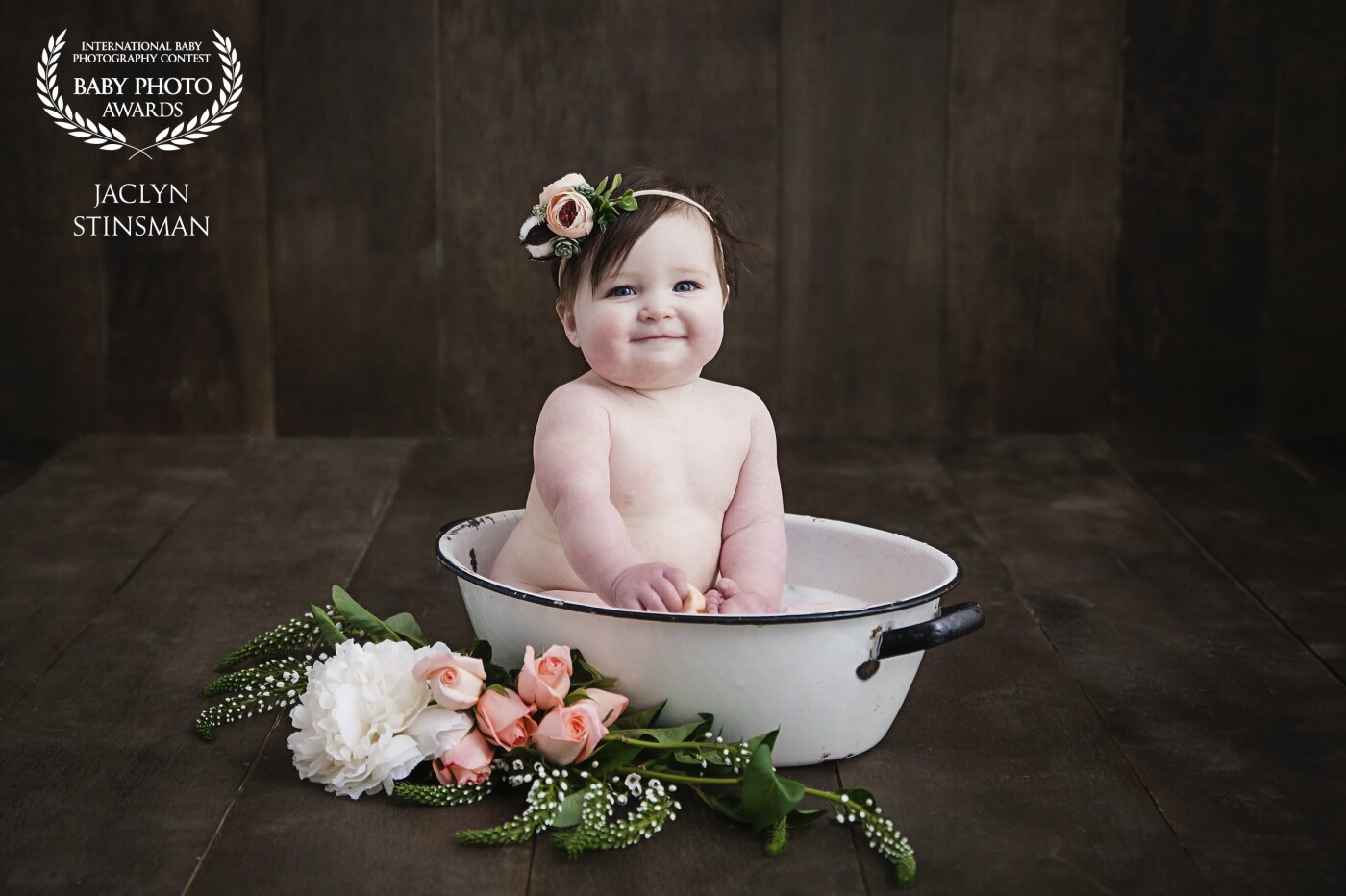 Scarlett at 8 months for her milk bath session. We have been photographing Scarlett since she was in the womb. We also customize every session for our clients to make it perfect. Scarlett's mom loves the woodsy flower theme and of course, needed to see her splash in the tub!