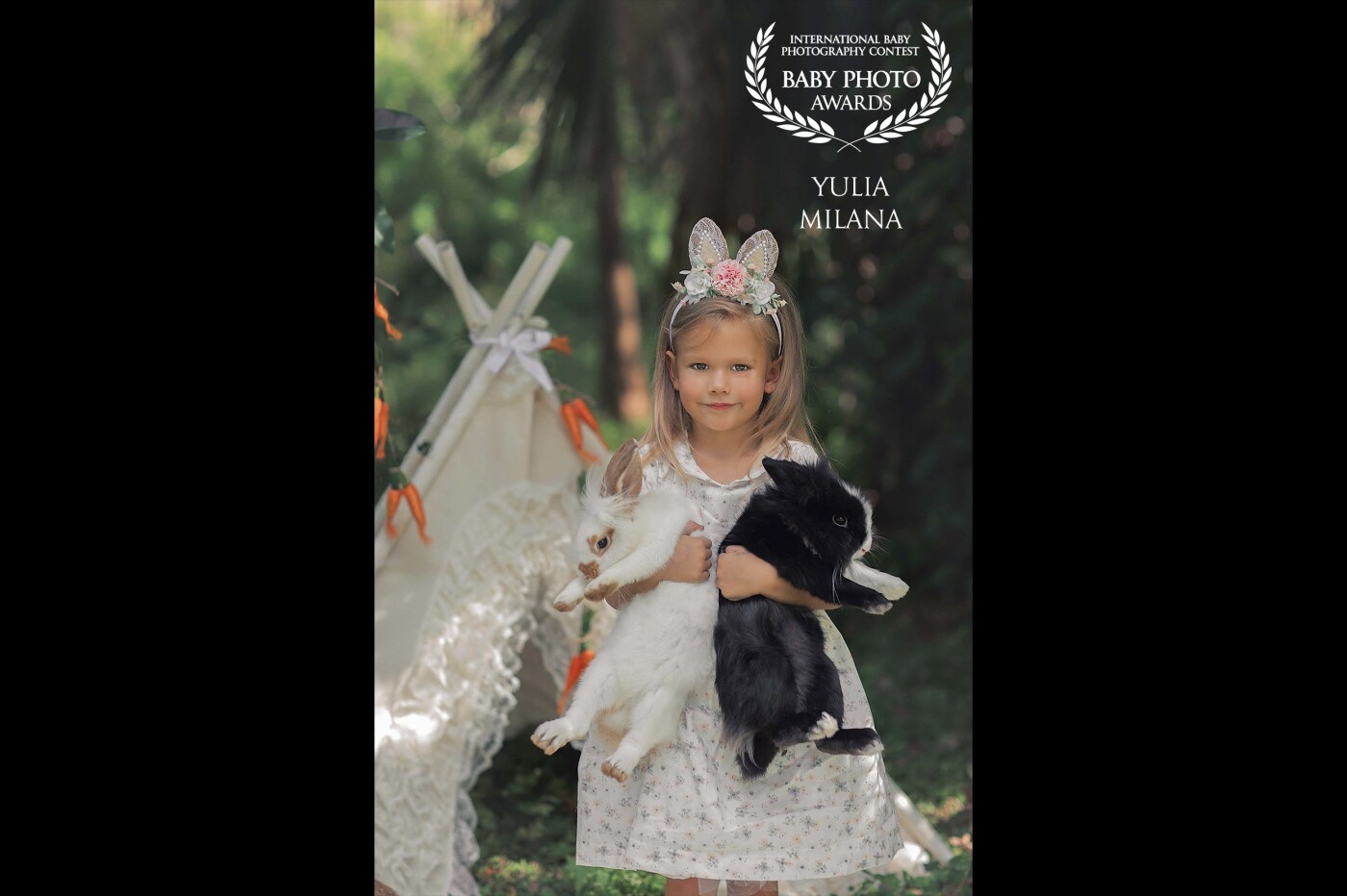 Adorable little Evelina and two big bunnies. This photo was taken for an upcoming Easter and what a fun shoot it was, bunny chasing and all :) 