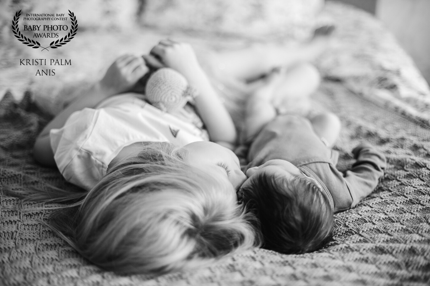 The sweetest little second between an older sister and her baby brother. This photo embodies everything I love when photographing kids in general -  natural and relaxed style, the sincerest emotions and moments to treasure.