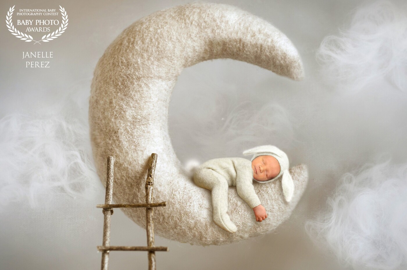 Newborn pictures are some of the most important photos you will take of your child. I always aim to have my photographs capture the innocence of the little one. In this picture, the baby is seen sleeping blissfully on the moon as the clouds swirl by. When I think of a baby's first moments, I envision all the tender memories a parent will want to remember which is what I attempt to capture in my photographs. I know the photos will create an everlasting memory that the parents will cherish forever. 
