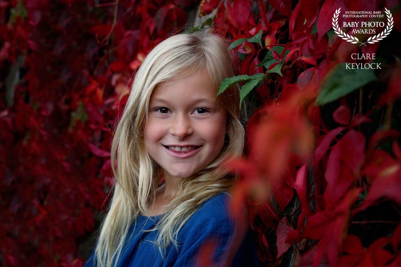 The Autumn colours were spectacular this year, nature is so amazing as is my sweet daughter in the photograph. I walked pass this wall of beautiful red foliage several times and knew I had to photograph it.