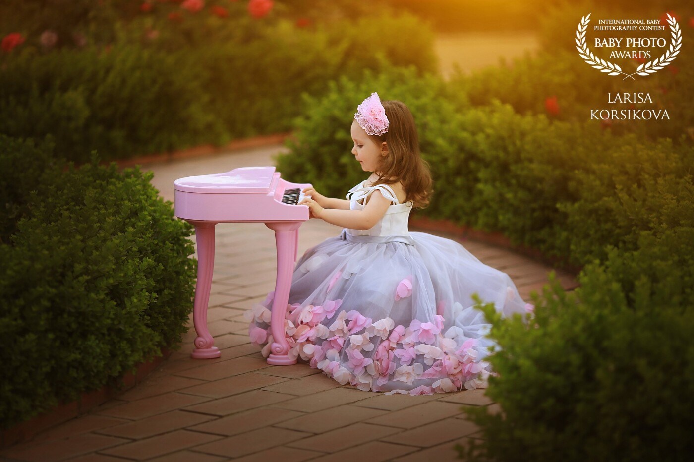 My little starlet adores music. She likes to play her tiny piano, dance, and sing. She always gives me new ideas for the photo-sessions. 