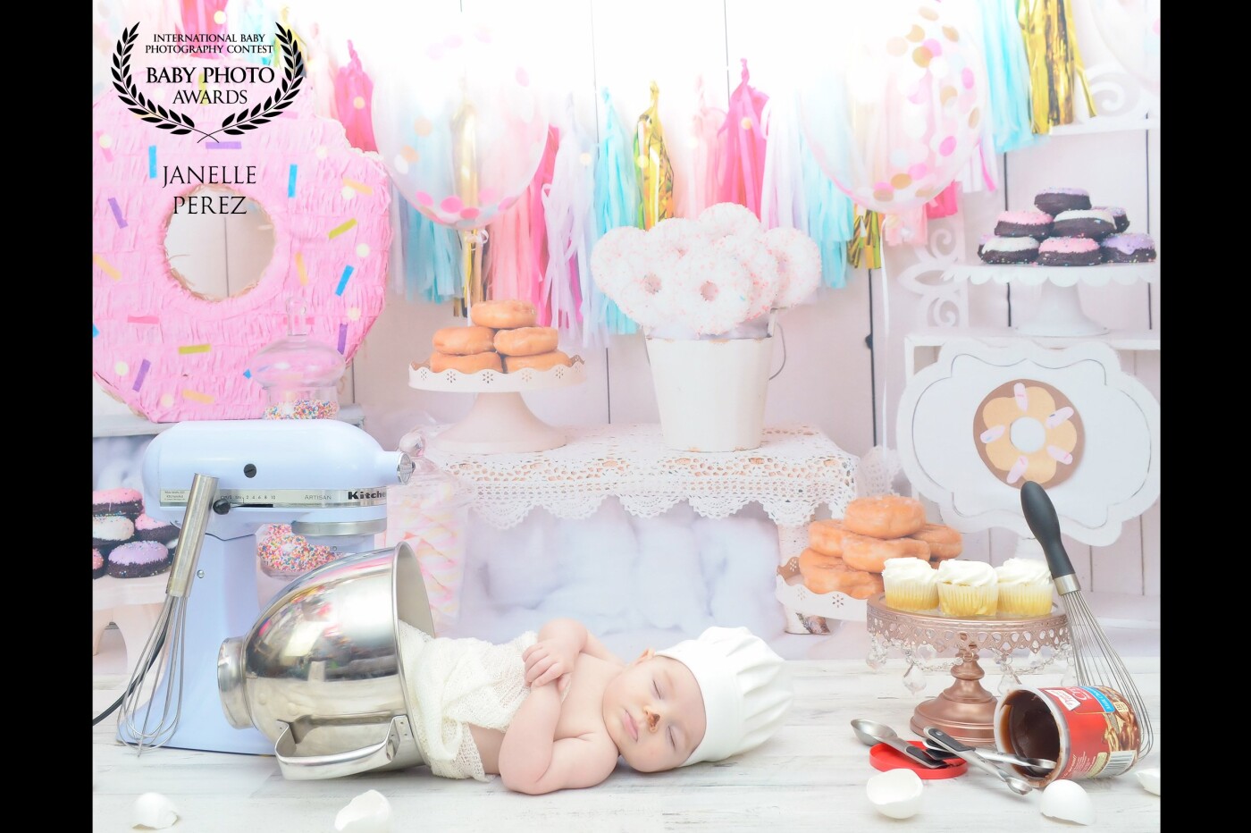 Thank you for selecting this image. Nothing is sweeter than a sleeping baby drifting off to dreamland while laying in her mother's mixing bowl. My client owns a local bakery and requested that various supplies from the business be used as a part of the props for her new born photoshoot.
